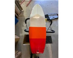 Naish Comet 5' 2" surfing surf foilboard