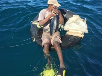 Man found 2km from shore, fishing from an inner tube! - Fishing News